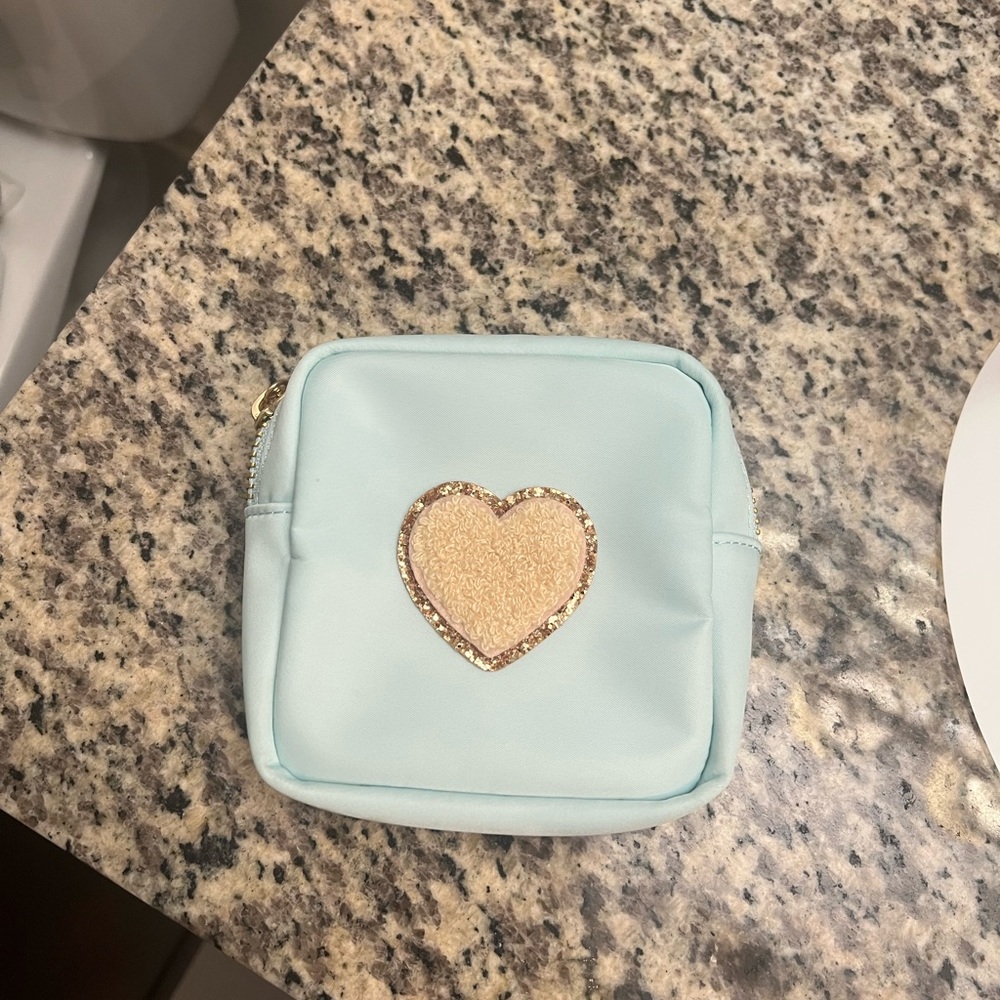 Gently used Stoney clover pouch